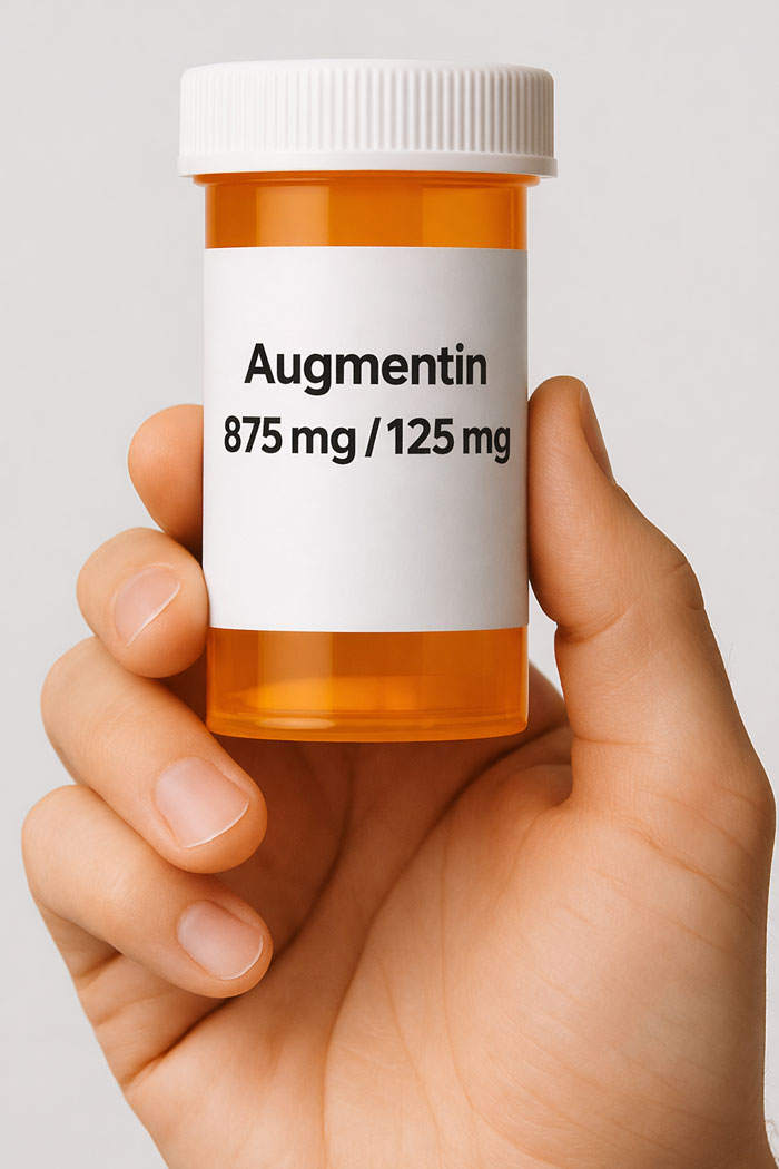 Augmentin tablets containing amoxicillin trihydrate and potassium clavulanate